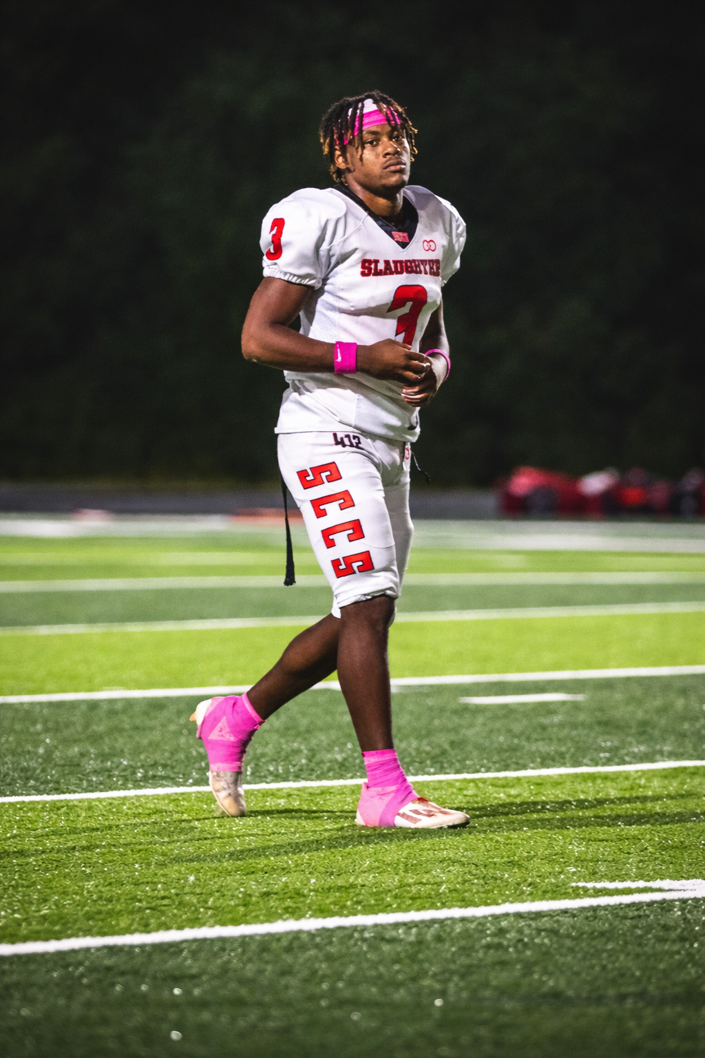 focused athlete under stadium lights